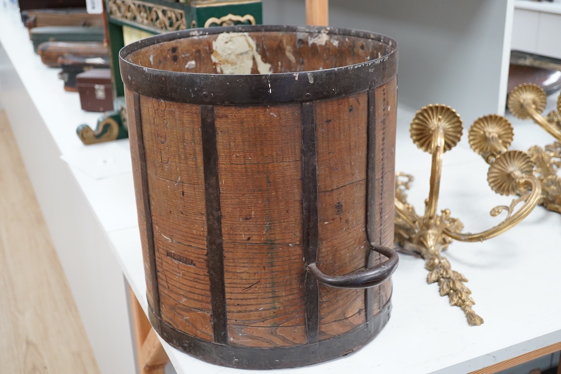 A Georgian iron framed oak Bushel measure, stamped with ‘BUSHEL’ and a crowned GR, diameter 36cm, height 38.5cm